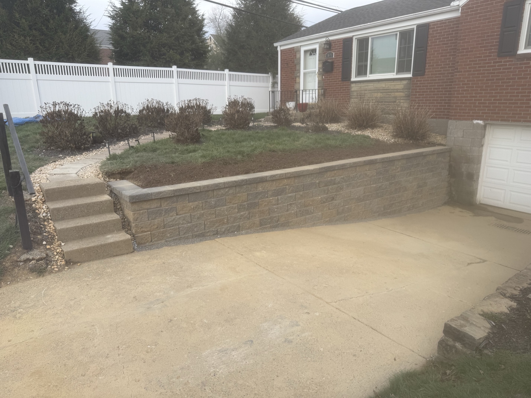 Hillside retaining wall installation in Pittsburgh